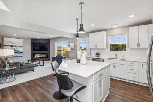 Photo for 21942 Primrose Path, Farmington, MN 55024 - Listing #6486300 NEW CONSTRUCTION TOWNHOME - END location with3 walls of windows. Completing construction late May. Lennar's Colonial Patriot Collection "Jefferson" floorplan. (Photo of decorated model, actual home's finishes may vary slightly)