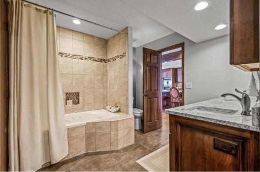 Main floor master bath & laundry with infloor heat!