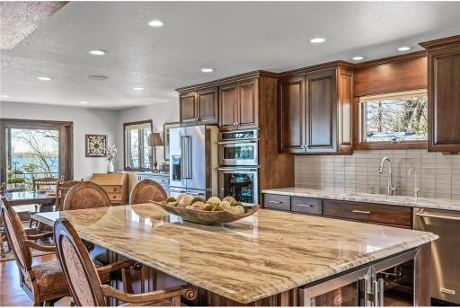 Quarzite tops compliment the custom Cherry Wood cabinets!