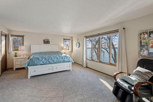 Wake up to beautiful lake views in the upper level owner's suite!
