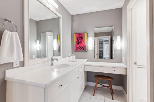 Heated tile flooring and plenty of space for more than one to get ready at the same time.