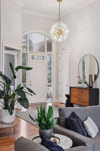 Wonderful natural light and a front entry closet (right)