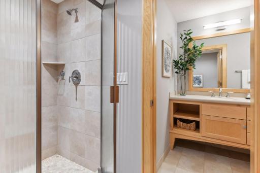 Nice privacy with separation of the shower/toilet from the sink area with the doorway.