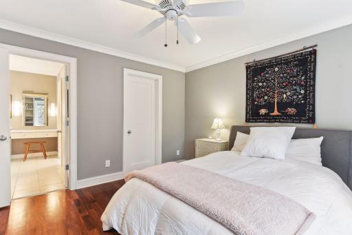 (Cont. Bedroom #1) features a spacious walk-in closet and bath ensuite that duals as a walk-through to the Loft area for ease of use.