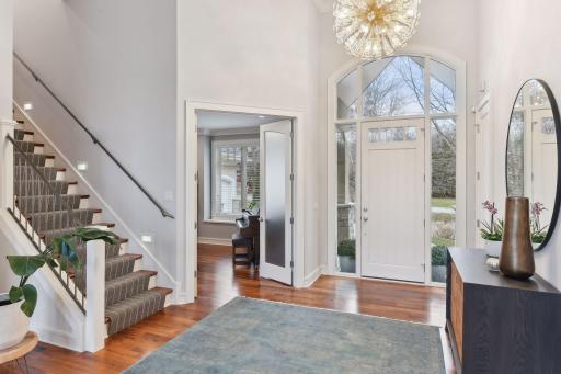 Convenient main floor office/den room with glass french doors.
