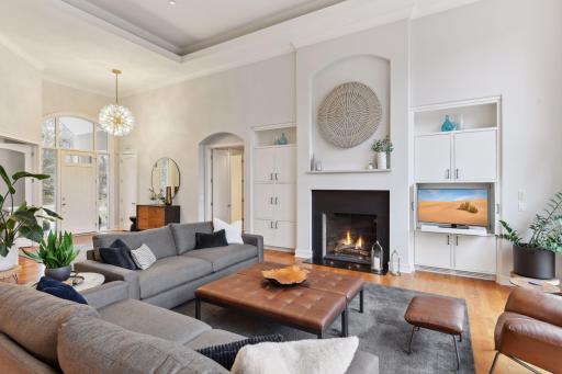 Arch design details throughout and a cozy gas fireplace...