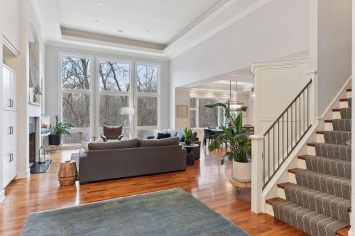 Walls of south facing windows for beautiful natural light throughout the home. New wool stairway runner.