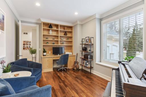 Main floor Office/Den/Sitting Room or a flex room for a guest needing no stairs and to be on the main floor. Two wonderful entrances to this room for nice flow in the home.