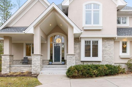 Charming front porch to watch the day go by....