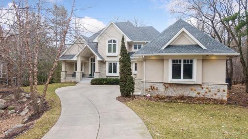 Charming curb appeal and thoughful design angling of the 3 stall garage....