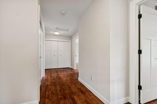 Second floor wide hallway showing second bank of large storage