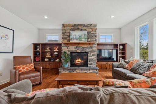 Lovely family room with all stone fireplace.