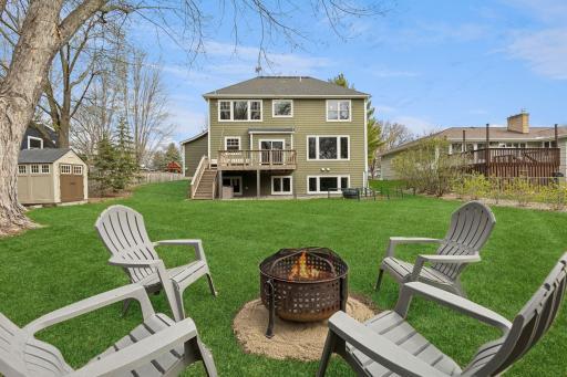 Fireplace/back of the home and large yard