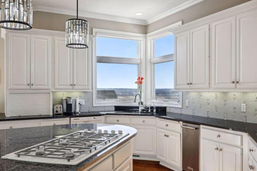 6-Burner gas cooktop with pop-up vent hood