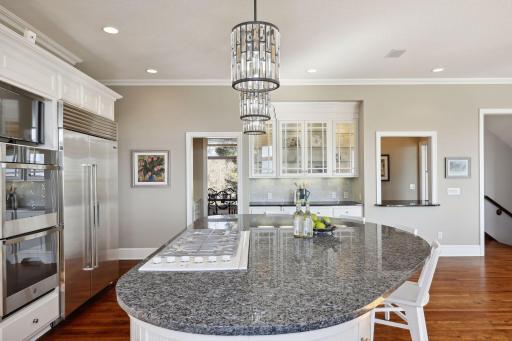Kitchen Includes plenty of storage with lit cabinets and a large walk-in pantry