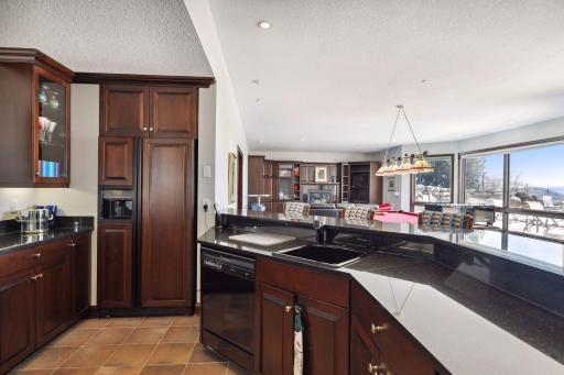 Fabulous wet bar with refrigerator, dishwasher and countertop seating