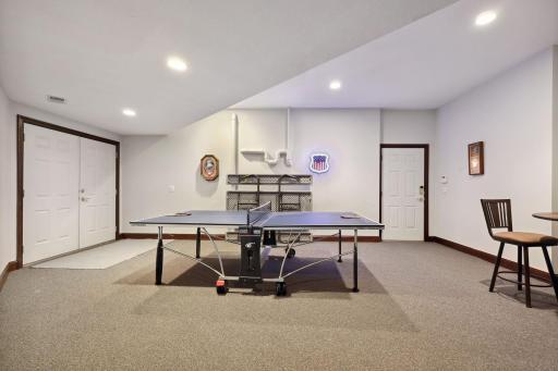 Flex Room w/ doors to the sport court and garage