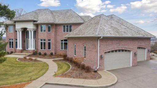 4-Car Heated Garage w/ guest parking spaces!