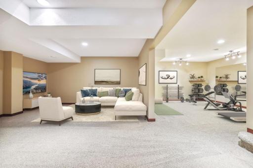 The lower level has versatile areas offering multiple options such as a family room, game room, or play area, creating a premium space for your leisure and entertainment activities. *Virtually staged to show design options.