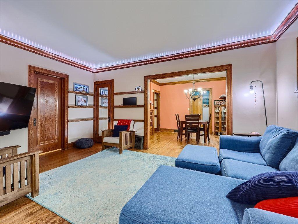 Spacious main floor family room w/ beautiful wood floor.