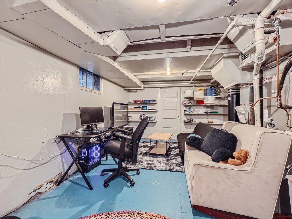 The lower level family room just needs some finishing touches.