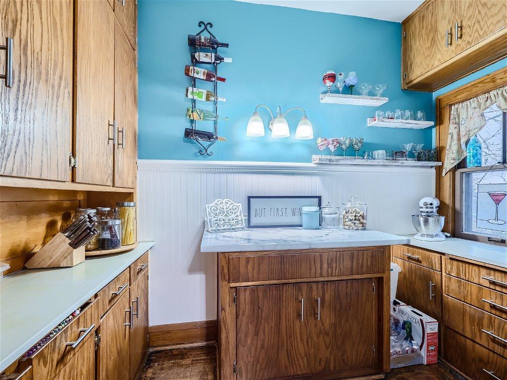 Butlers room just off the kitchen makes a perfect area for a coffee bar, bar area, extra kitchen storage +