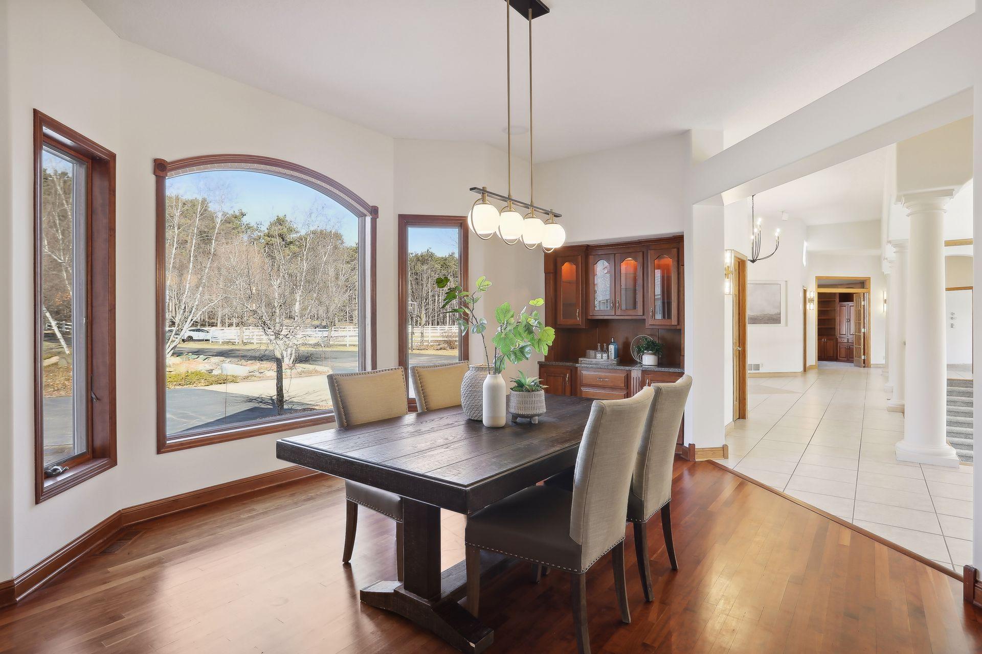 Beautiful windows adorn the formal dining space