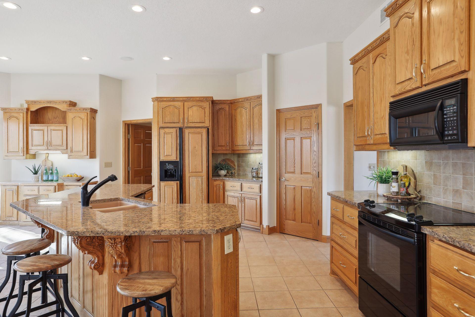 Abundance of cabinetry and walk in pantry