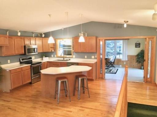 Photo for 5100 Camden Road, Baxter, MN 56425 - Listing #6487386 The four season porch is right off the kitchen.