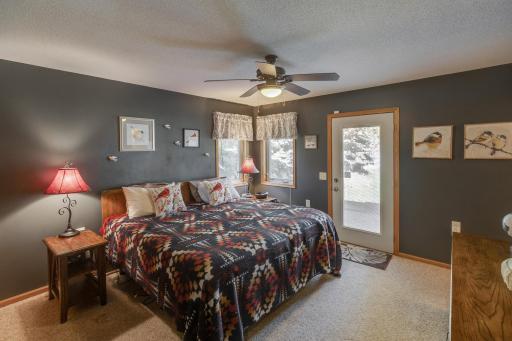 Photo for 5100 Camden Road, Baxter, MN 56425 - Listing #6487386 Owners suite with a large closet. The door leads you to the patio. Sit outside and enjoy your morning coffee.