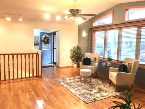 Photo for 5100 Camden Road, Baxter, MN 56425 - Listing #6487386 The spacious living room offers a hardwood floor and lots of great lighting from the big windows.