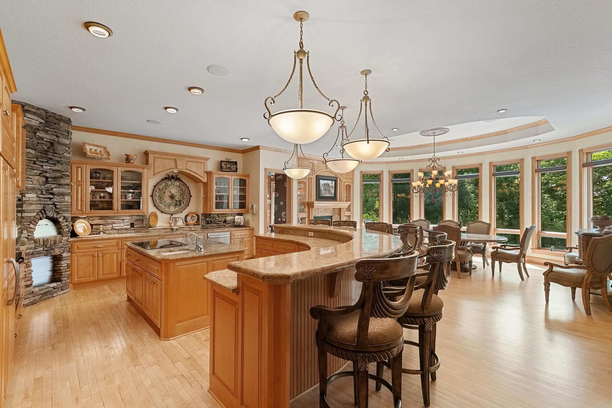 Vast gourmet kitchen with custom pizza oven - perfect home for entertaining!
