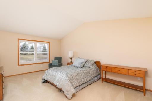 Photo for 1255 Langewood Drive, Mound, MN 55364 - Listing #6487603 The incredibly roomy vaulted primary bedroom offers a huge walk in closet, custom shutters and great view of the wetlands.