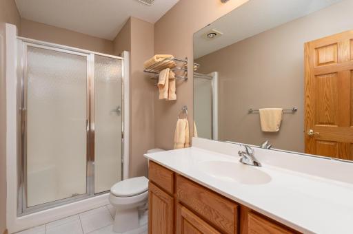 Photo for 1255 Langewood Drive, Mound, MN 55364 - Listing #6487603 The three quarter bath off the hallway has a ceramic floor and large vanity for storage. It is original but is truly in new condition!