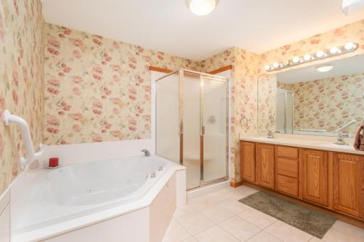 Photo for 1255 Langewood Drive, Mound, MN 55364 - Listing #6487603 A pocket door walks through to the main ceramic tile bath providing a large whirlpool plus separate shower and double vanity.