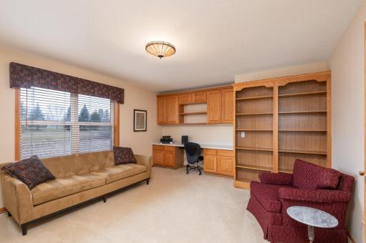 Photo for 1255 Langewood Drive, Mound, MN 55364 - Listing #6487603 French doors step into the main floor office with built in desk and book shelves. An oversize window brings in plenty of light and a wetland view.