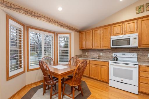 Photo for 1255 Langewood Drive, Mound, MN 55364 - Listing #6487603 Enjoy a morning cup of coffee in the eat in kitchen with a cozy dining space. Notice the high quality plantation shutters.