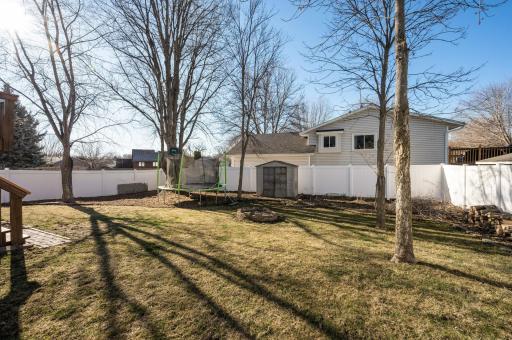 The backyard is flat and great for yard games. There is ample space for kids and pets to run and play safely in this yard.