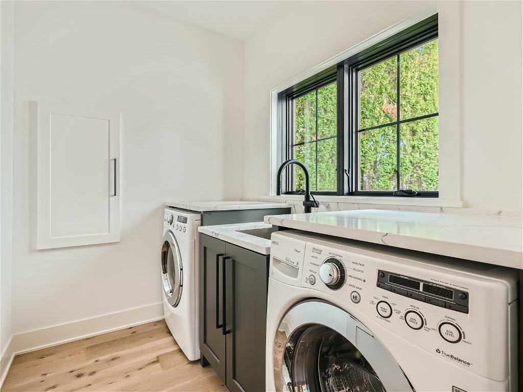 Main floor Laundry Room w/Rejuvenation lighting!