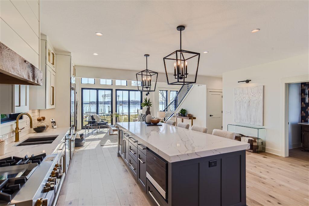 3-inch thick Atlantic quartz island with matte-black fixtures above!