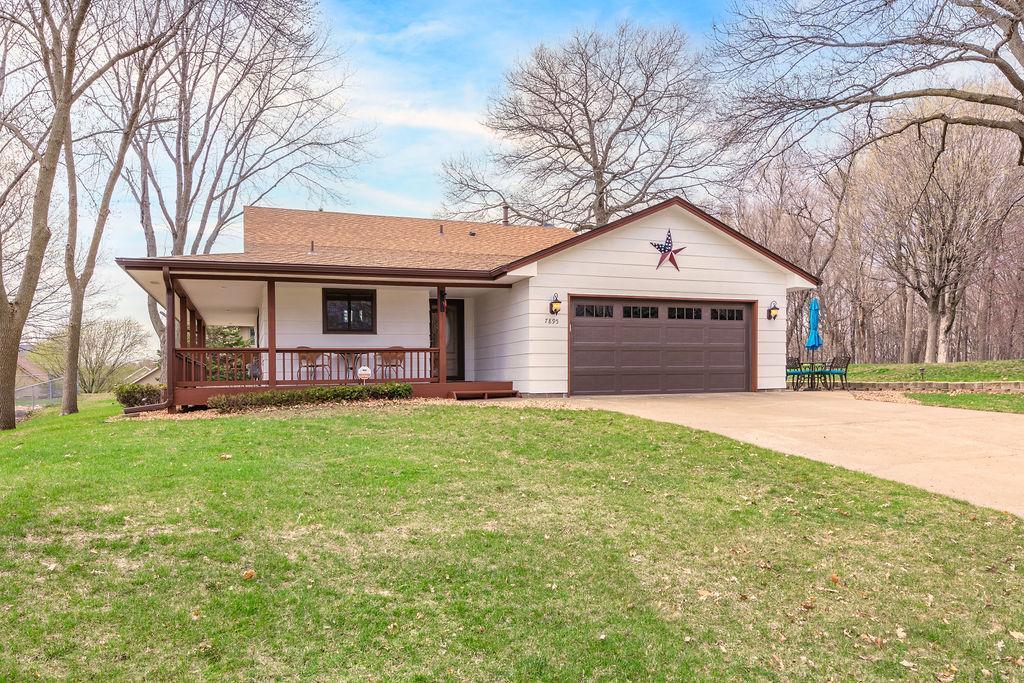 Welcome to 7895 Ranchview Lane, Maple Grove. Location, Location, Location! Attractive curb appeal with showstopping wrap-around covered porch. Mature corner lot, massive concrete driveway and spacious yard.