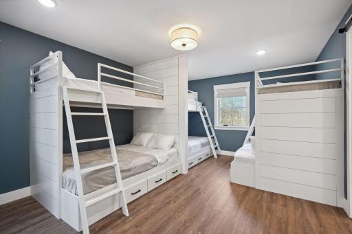 Bunkroom with 2 twin over full and 1 twin over twin.