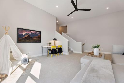 Upstairs loft with half flight up to the bedrooms