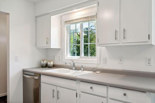 Updated kitchen cabinet hardware and professionally washed windows.