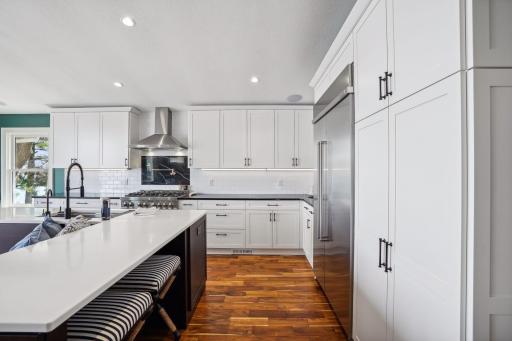Along with the other brand-new appliances, this kitchen boasts a dual-fuel range! The oven is electric, while the six burners are fueled with gas.