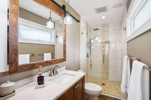 This owner's suite bathroom was fully renovated.