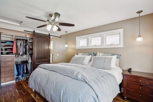 Owner's suite with a closet renovation. More south-facing privacy windows were added for extra light.