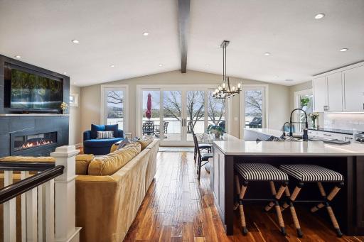 The view as you enter the upper level! A new full lakeside remodel of this home was completed in early 2024.