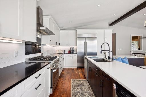 Lots of quartz countertop space is available for the seasoned chef!