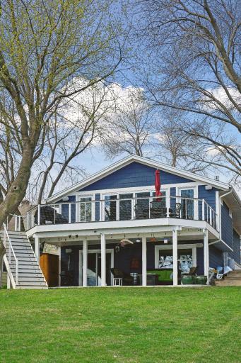 A gently sloping lot makes trips to and from the dock, lake and firepit easy.